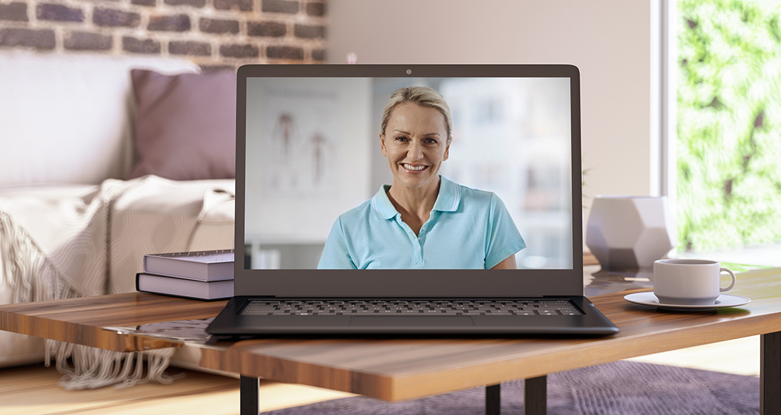 Telerehab doctor on laptop screen